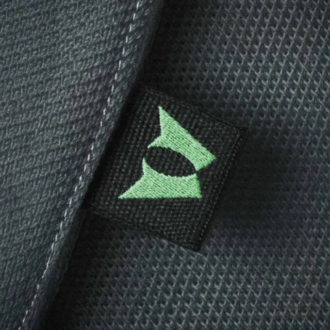Bloom emblem embossed on technical fabric