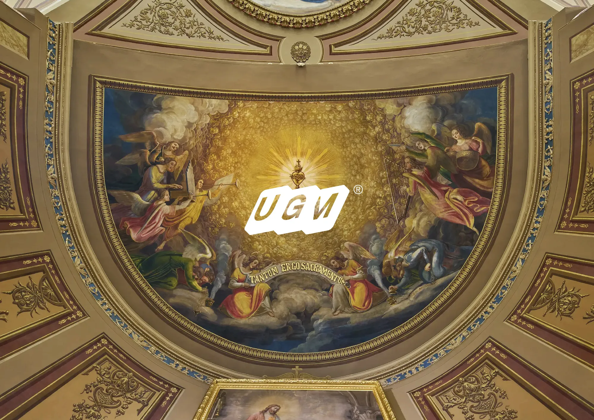 UGM mark on a gilded ceiling